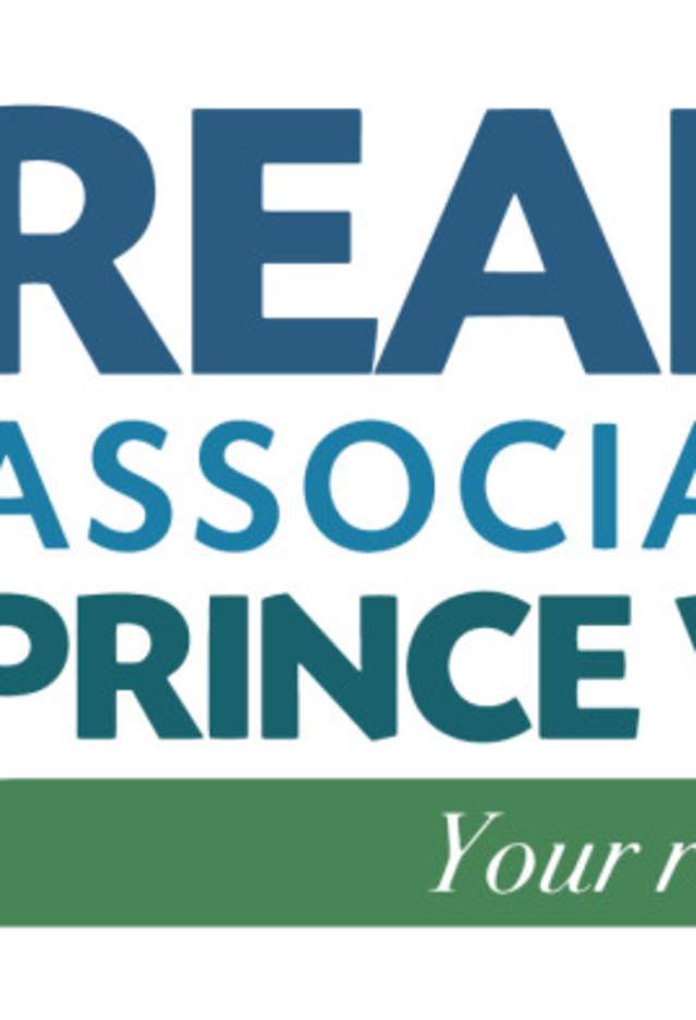 A white, blue and green logo. The logo has 3 houses on it and the words "PWAR Realtor Association of Prince William Your real estate advocate" written in text on the image.