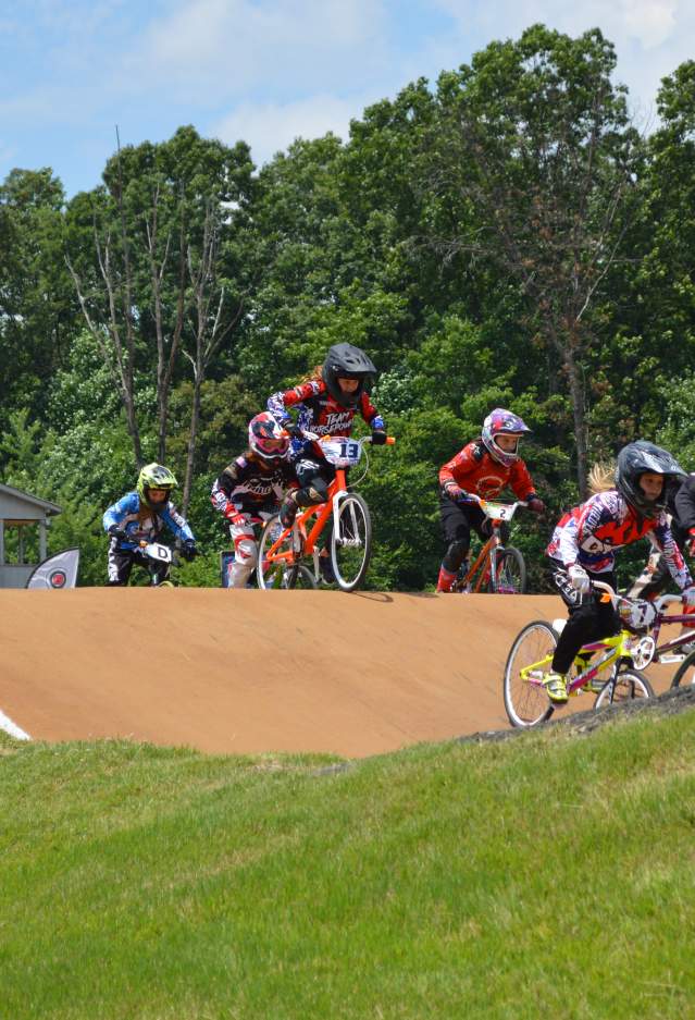 Children on a course participating in a BMX bike race