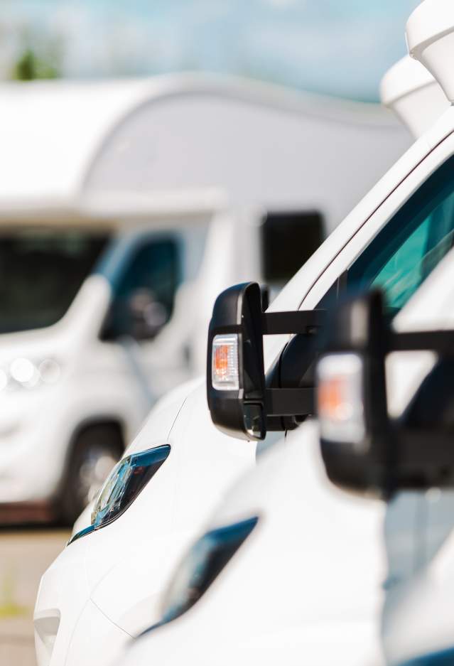 Recreational Vehicles parked next to each other