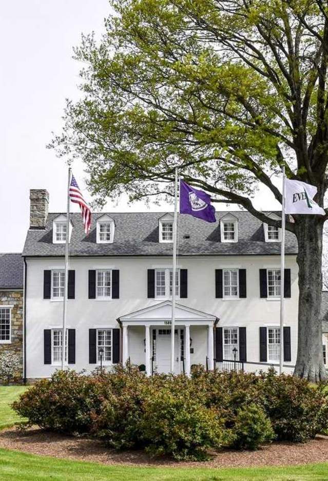 exterior view of The Inn at Evergreen front lawn and manor