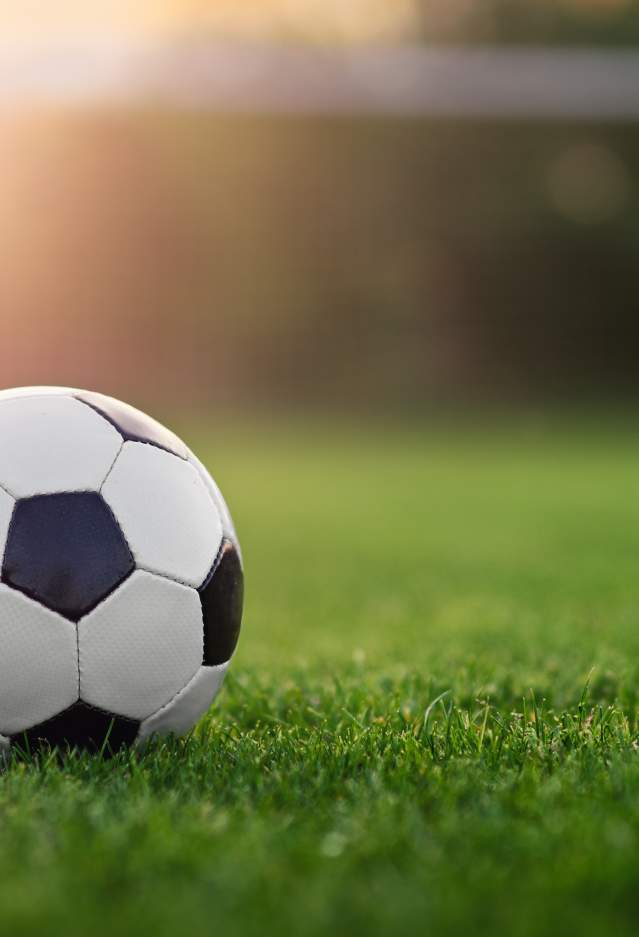 Soccer ball on an empty soccer field