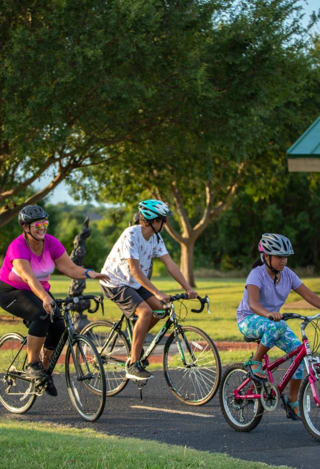 Family of 3 cycling