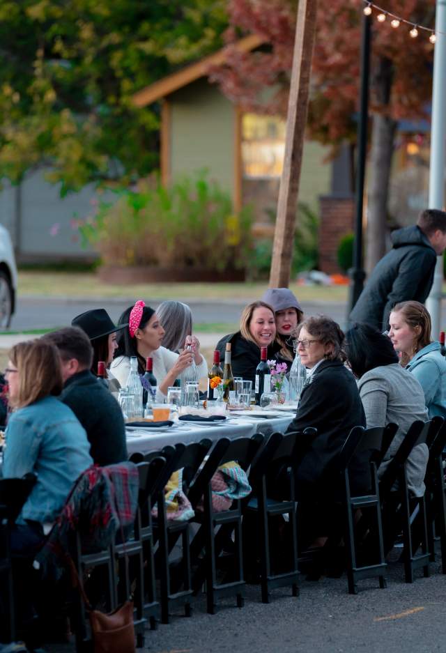A large group eating outdoors