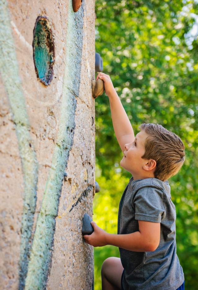 Boy on a climbing wall