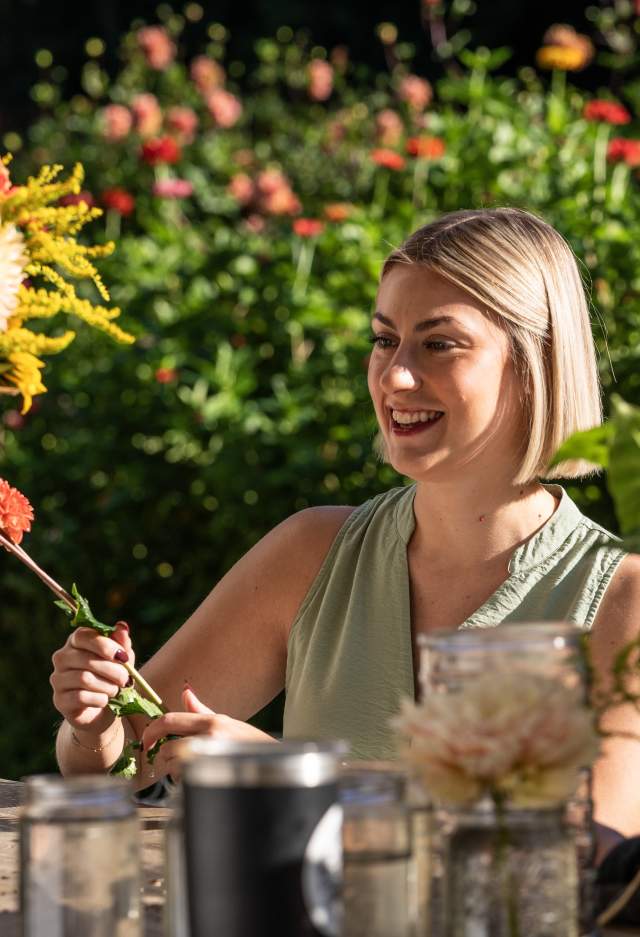 a customer purchasing beautiful flowers at Terra Farms