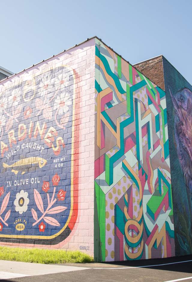 a few of the colorful murals at Mural Park in the Royal Square District
