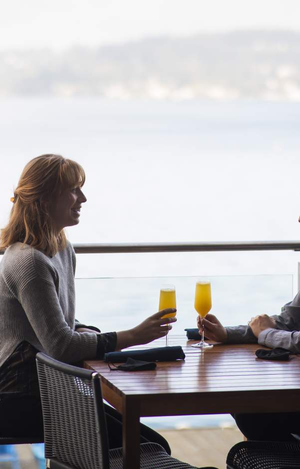 2 women enjoying drinks at Water's Table
