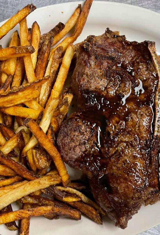 steak and fries on a plate
