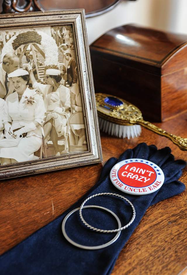 Display of historic photo and items on desk in the Old Governor's Mansion