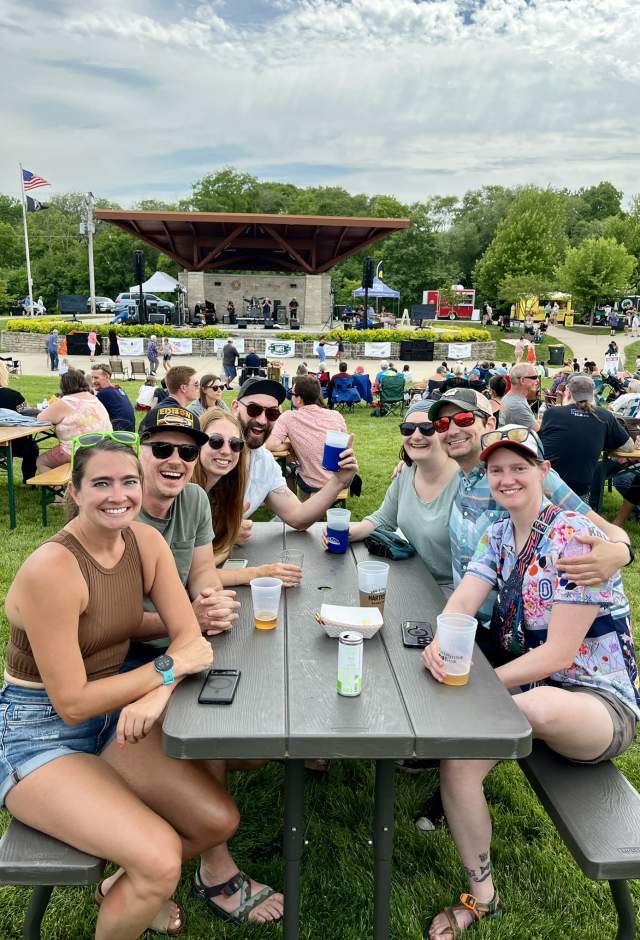 Friends enjoying beverages at HartFest