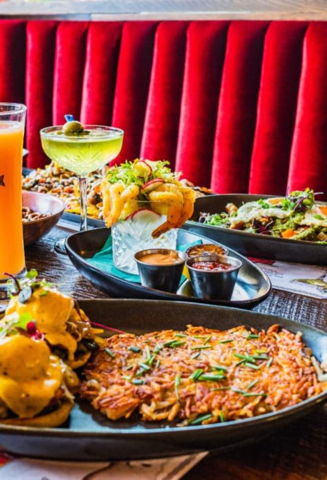 Brunch food and drink items on a table at Buckatabon in Wauwatosa