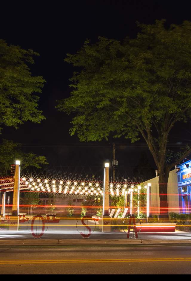 Nighttime image of North Ave with lights blurred
