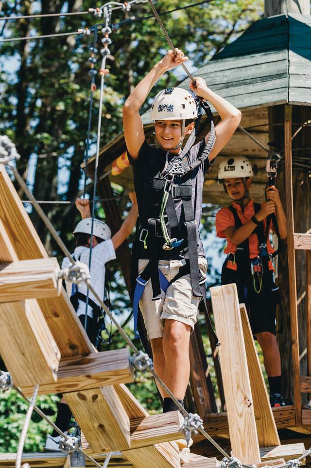 Alpine Adventures - Teens Navigating a Ropes Course