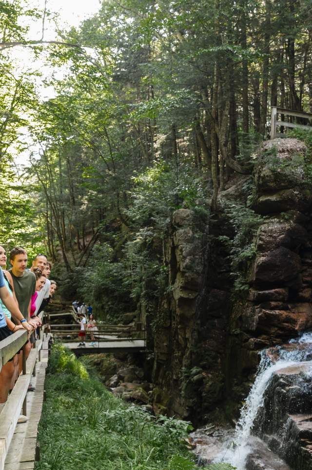Flume Gorge - Visitors Admiring the View of Avalanche Falls