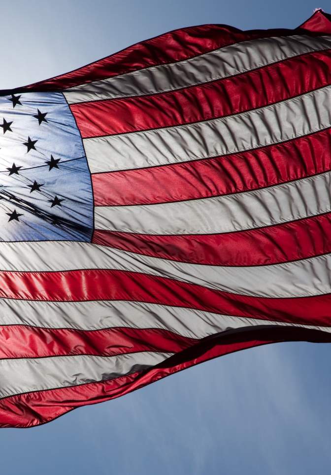 An American flag blowing in the wind