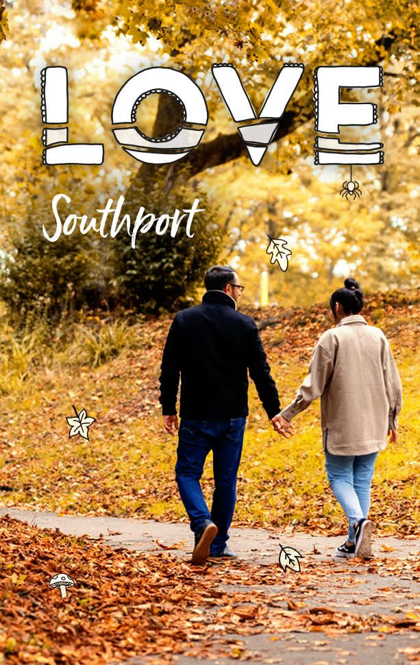 Couple walking through the park