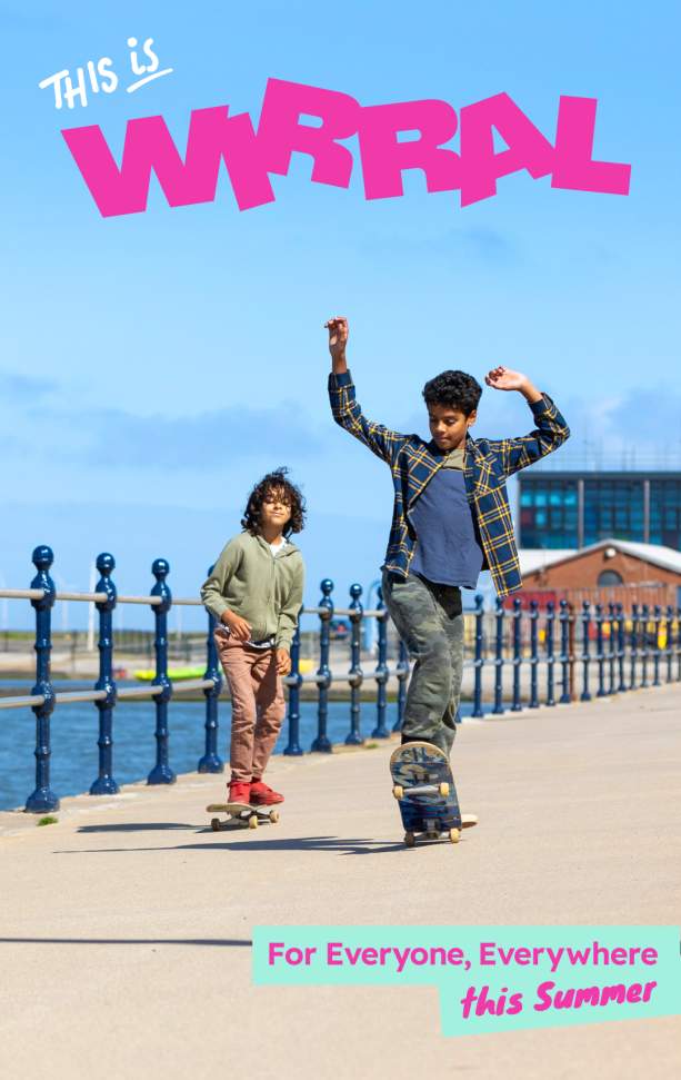 Two children skateboard on New Brighton seafront