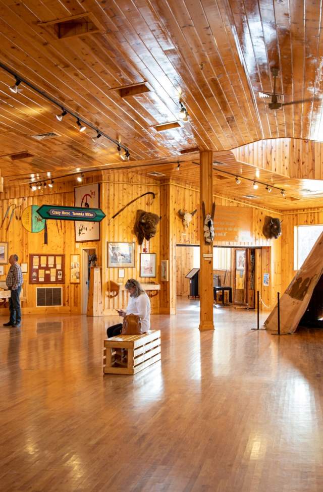 wood floors and ceilings with native american exhibits at the indian museum of north america at crazy horse memorial