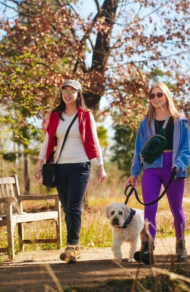 Women walking a dog