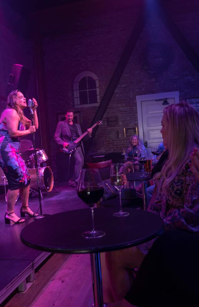 Woman performer singing at the Merc in Temecula