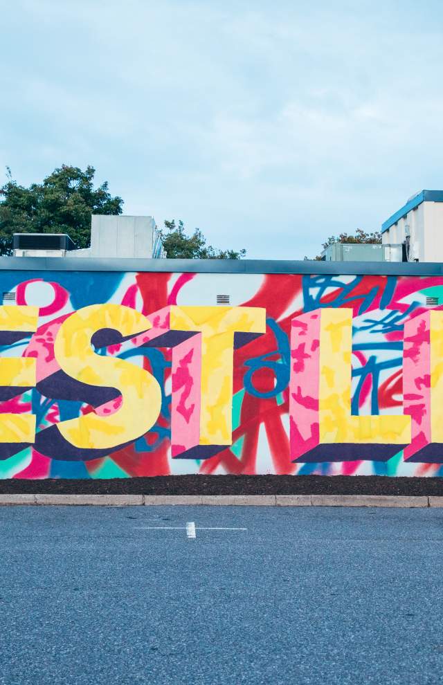 A colorful street art mural that reads: Best Life