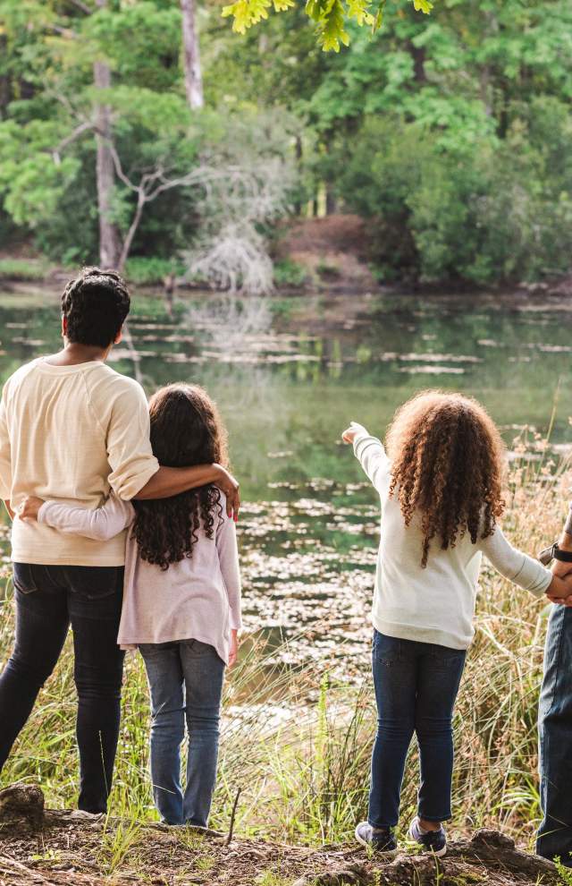 Family looking at a lake