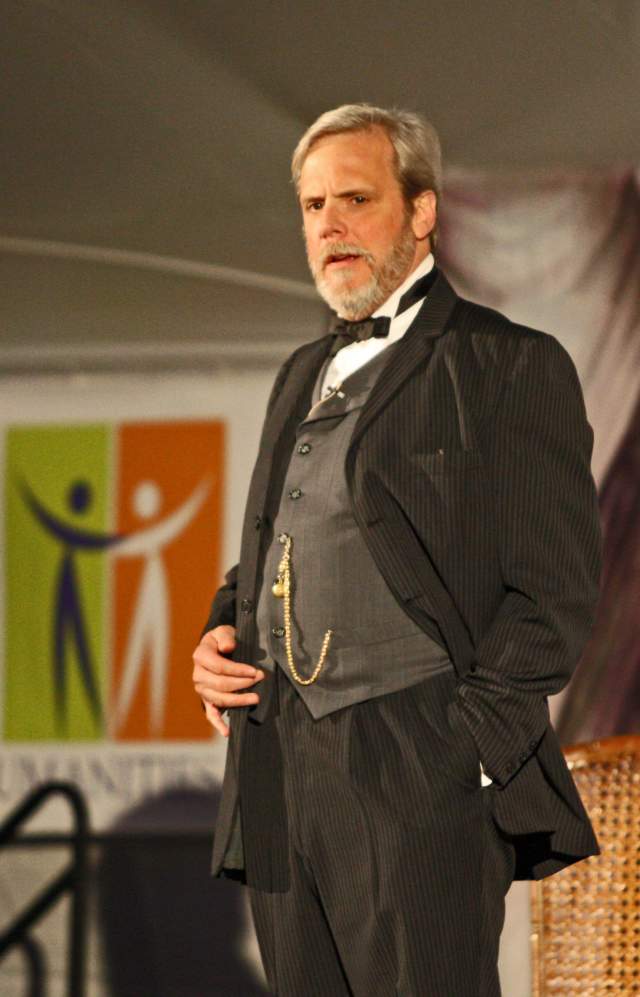 Actor on stage during High Plains Chautauqua