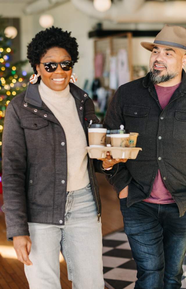 Man and woman picking up coffee before going shopping in Downtown Greeley.