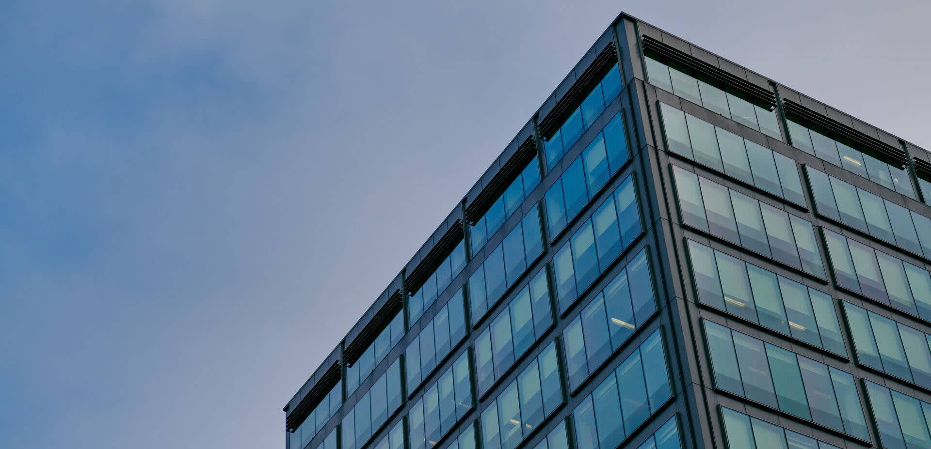 The top corner of the Colmore Building on Colmore Row, viewed from the street