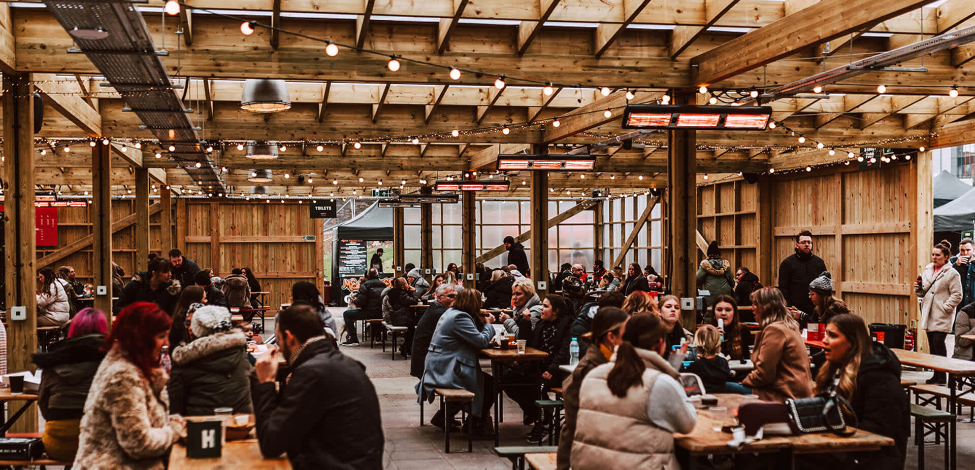 Large area of people enjoying a food event
