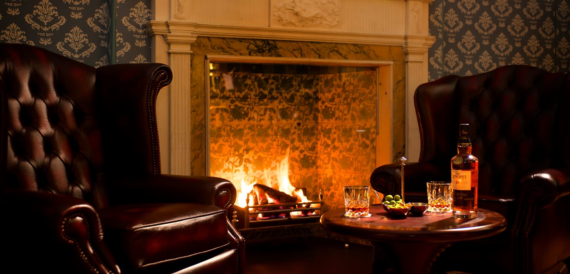 Fireplace in the lounge at GreyFriars Hotel