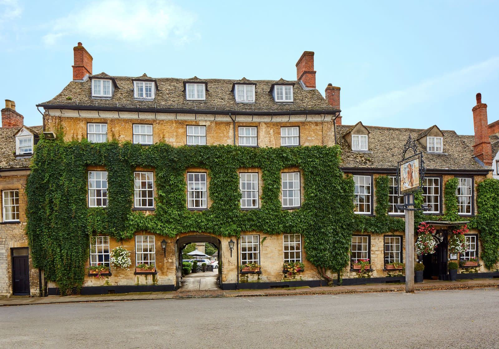 The honey-coloured facade of The Bear Hotel in Woodstock