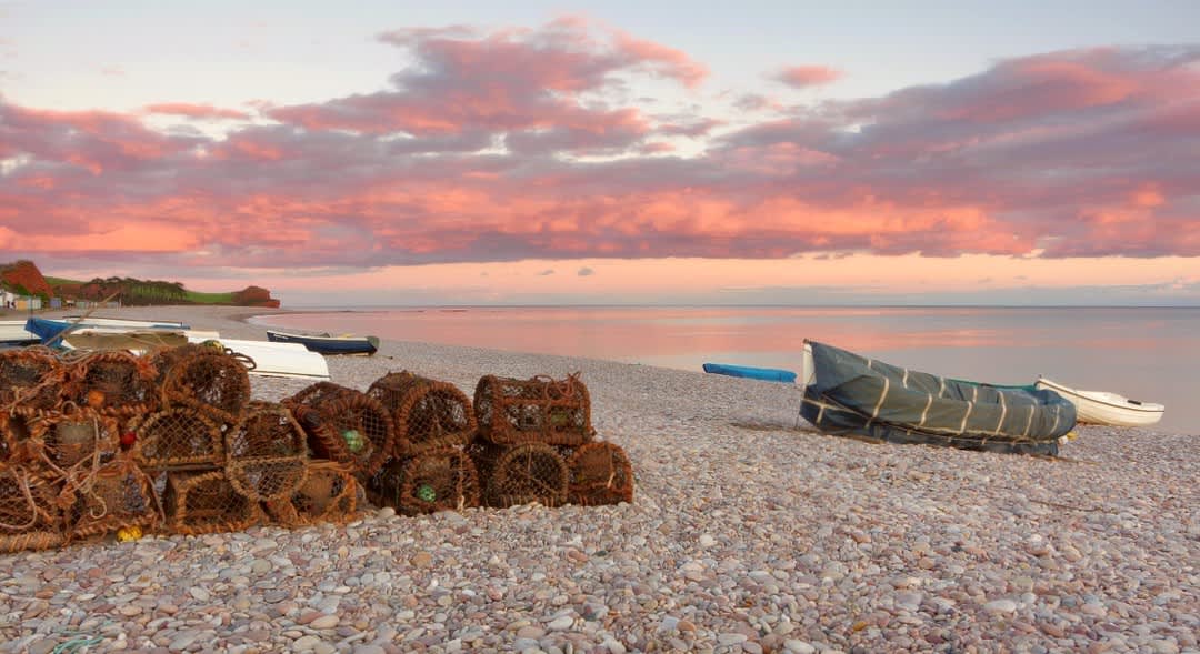 sunset over budleigh beach