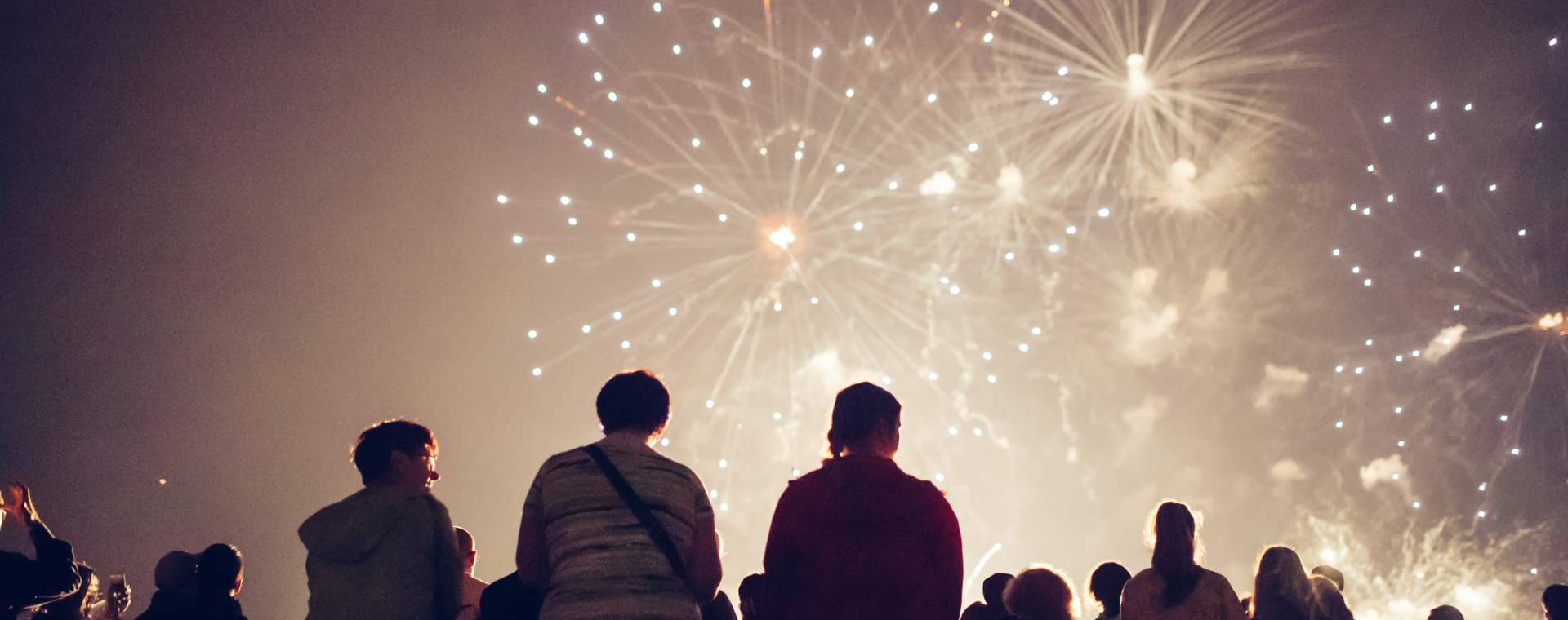 People looking up at the sky as a huge fireworks display takes place in East Yorkshire