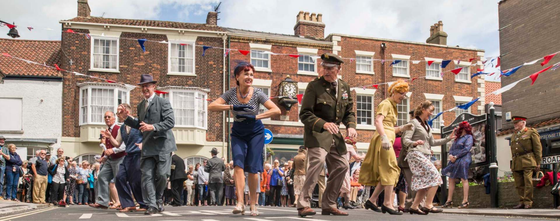 Dancers dressed in vintage clothing performing at the Bridlington 1940s and 50s Festival in East Yorkshire