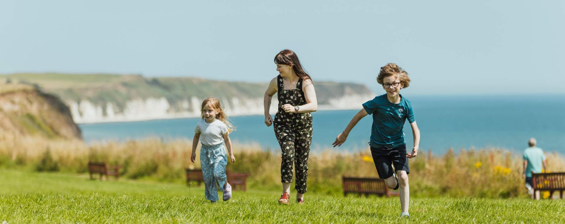 A mother and her two children on the cliff tops along the East Yorkshire coast