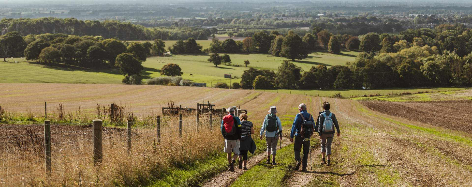 A group of people walking in the Yorkshire Wolds