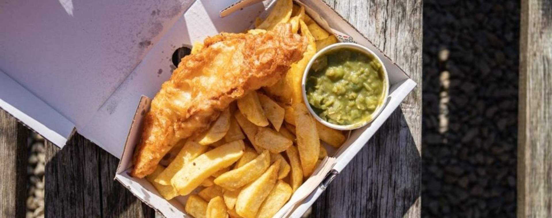 A takeaway box of fish and chips and mushy peas from Lighthouse Fisheries of Flamborough