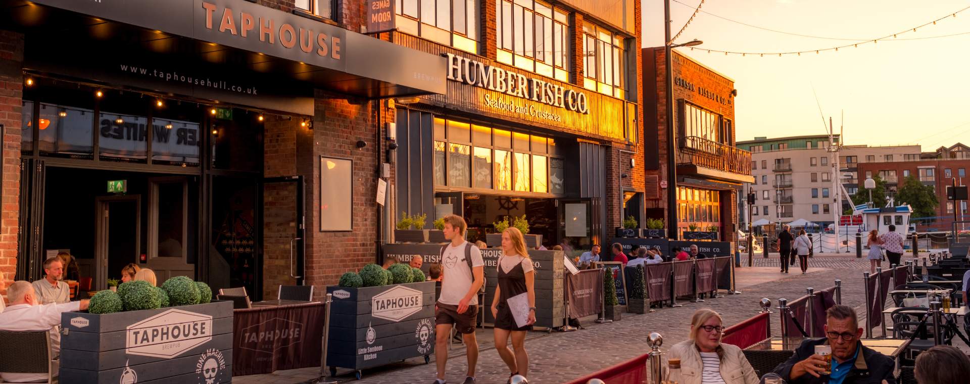Humber street, featuring Taphouse and Humber Fish Co at sunset in Hull