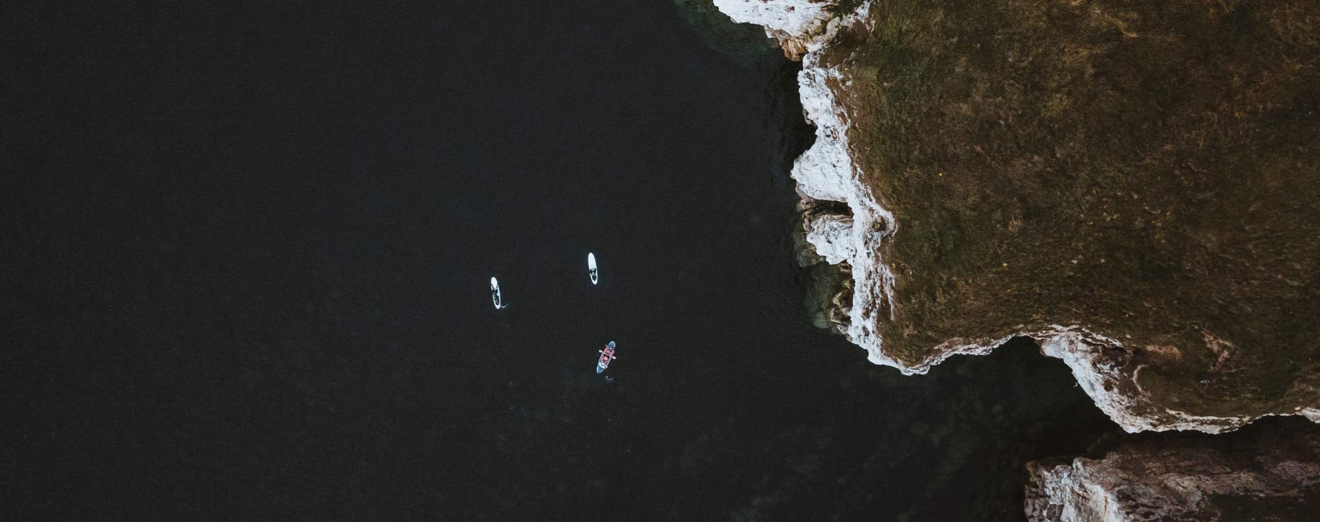3 kayaks along the flamborough coast