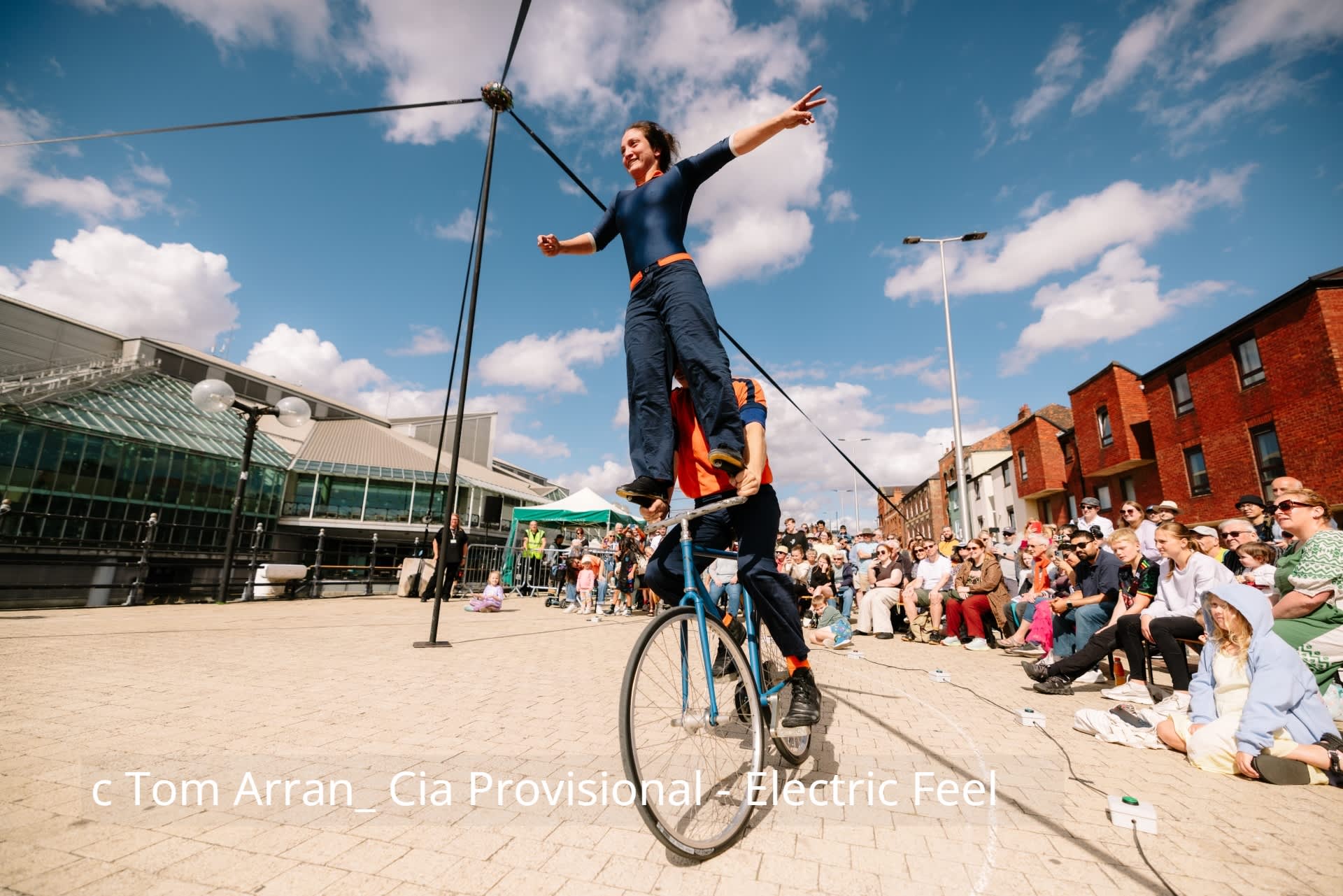 outdoor performers with a crowd watching in Hull