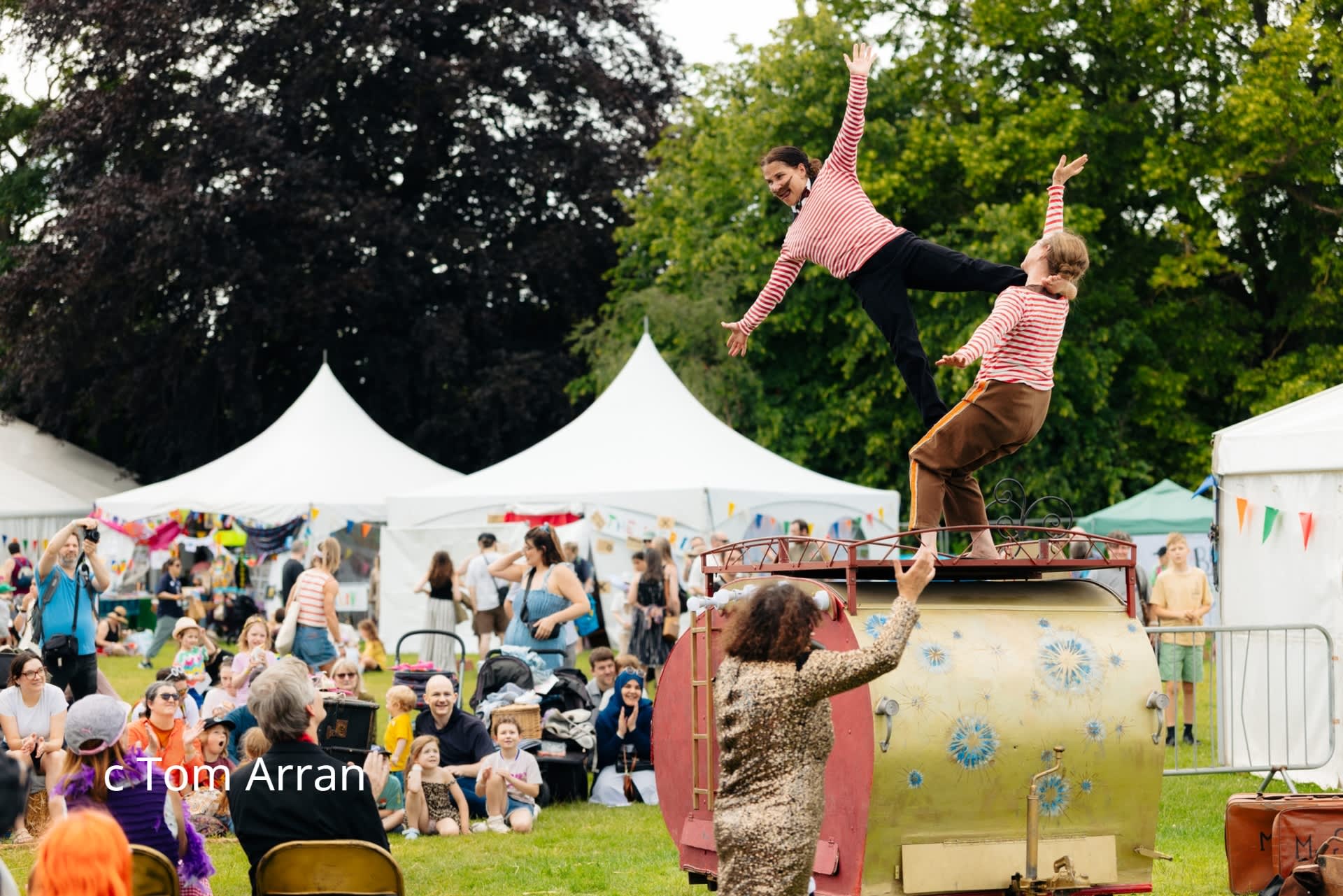 crowds enjoying an outdoor performance