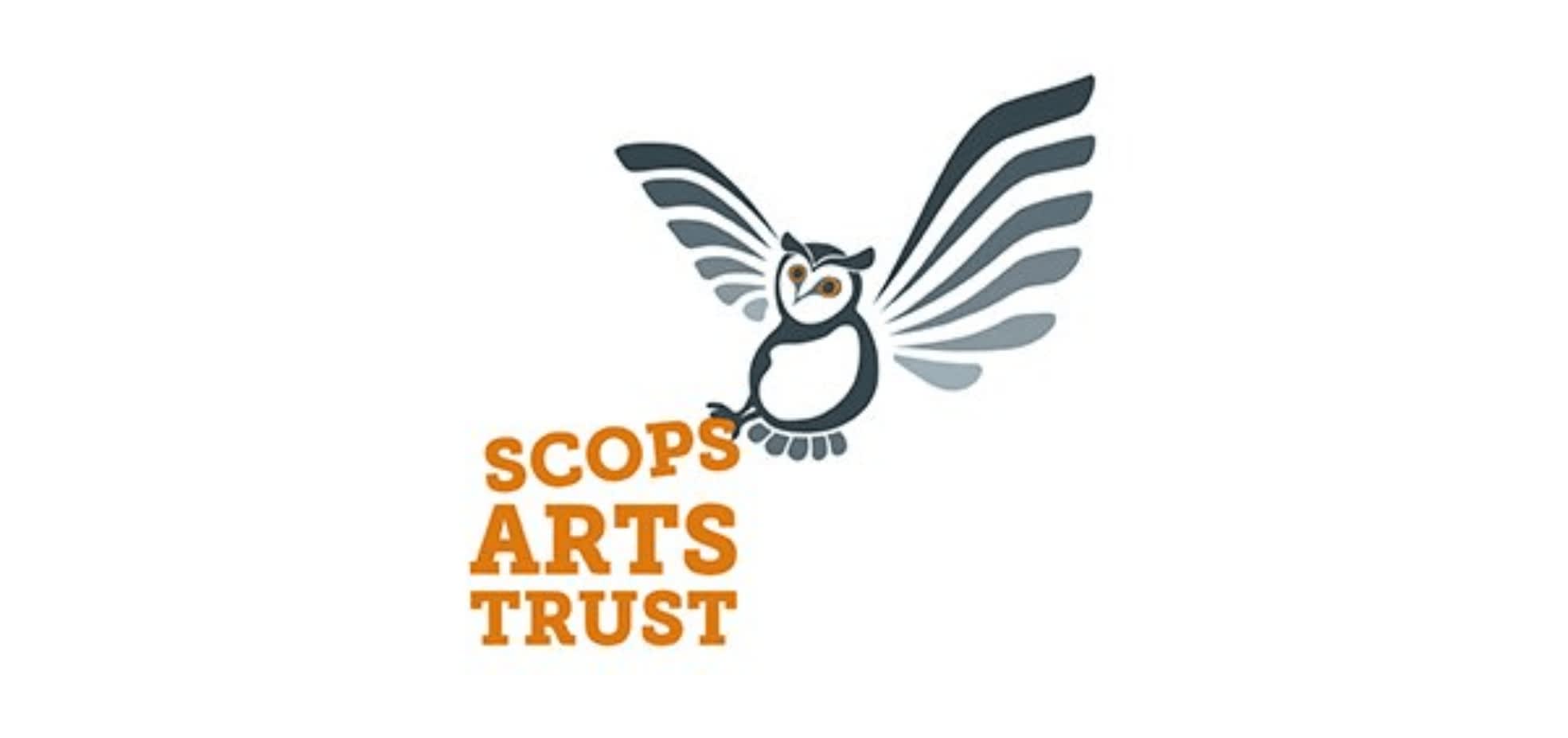The Scops Arts Trust logo has a black and white owl with it's wings spread out. Scops Arts Trust is in orange text on the left. The cartoon owl outline is on the right.