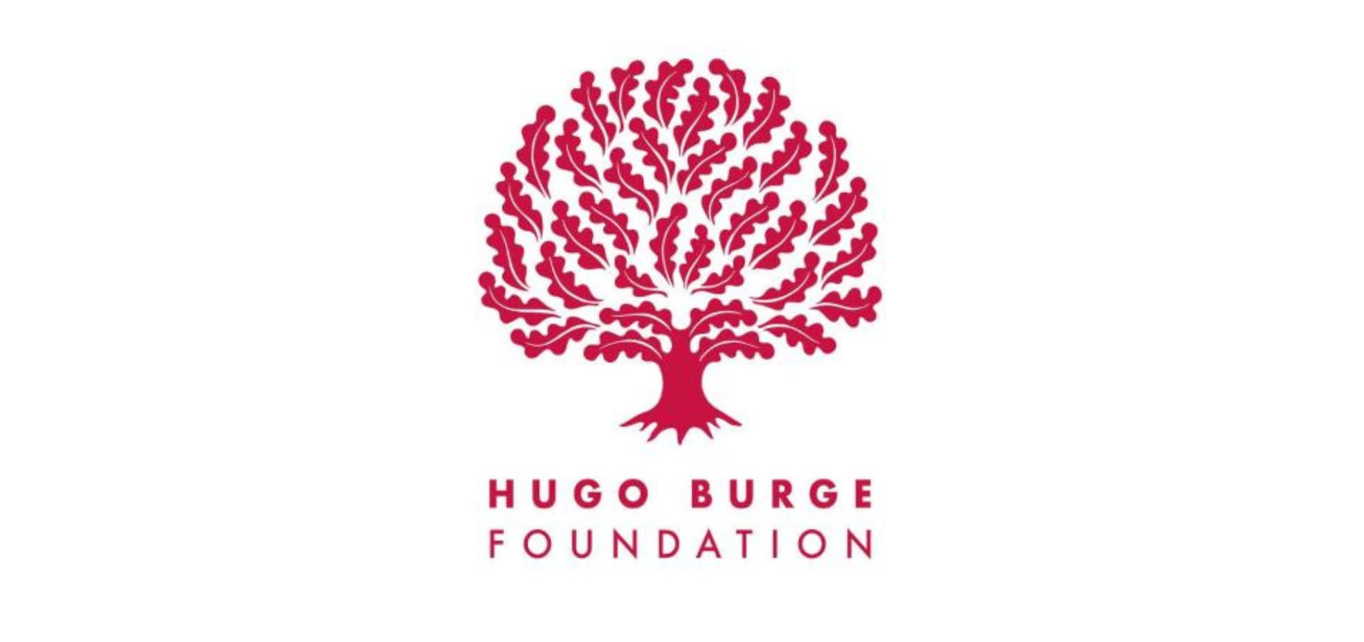 Hugo Burge Foundation logo. A red tree with text underneath in red saying Hugo Burge Foundation.