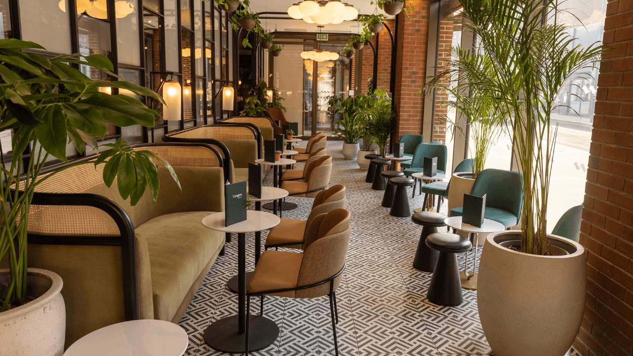 Inside the Halyard hotel with tables and chairs in a restaurant space