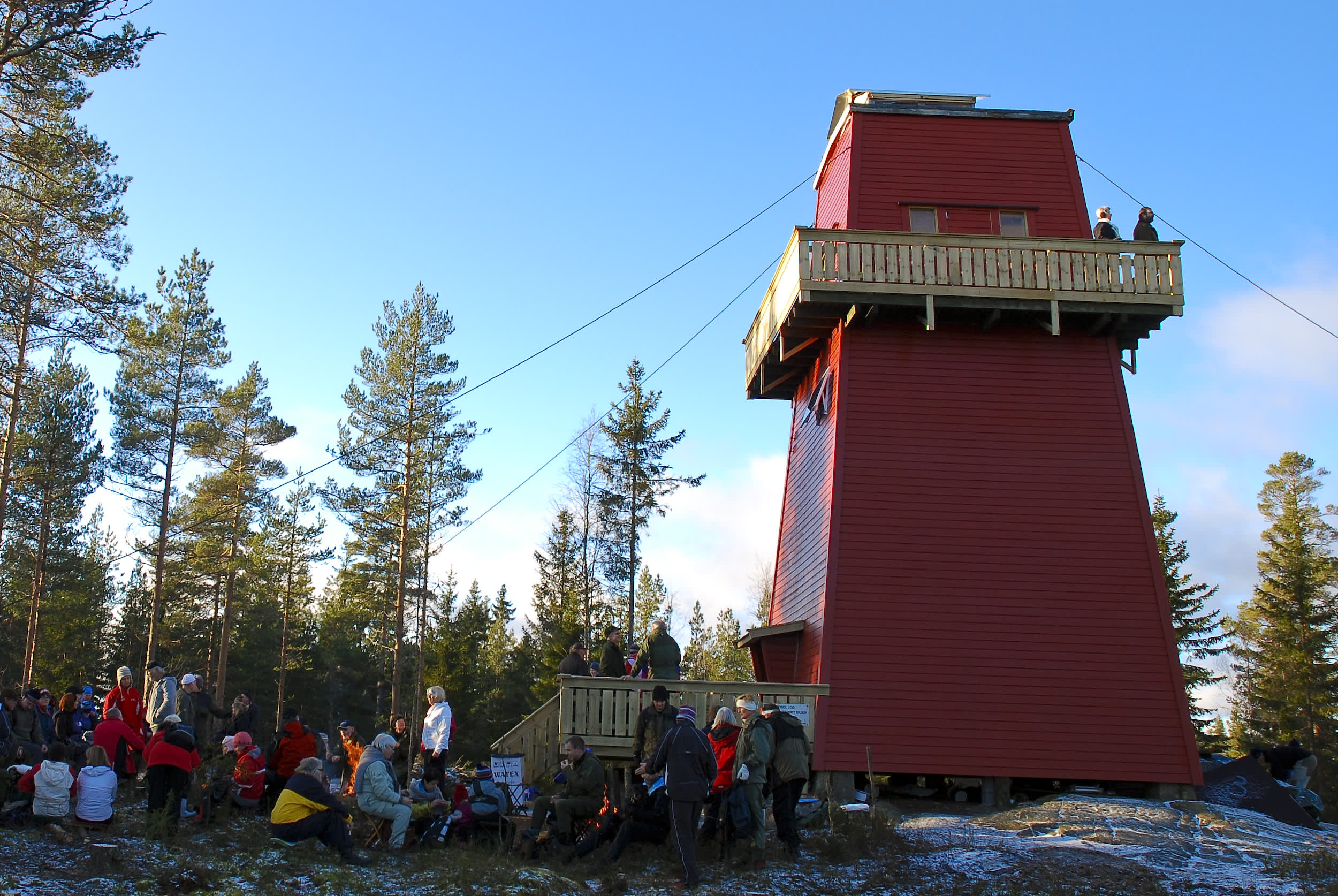 Lots of people outside the Hawks' Tower, reminiscent of the Moomin Tower