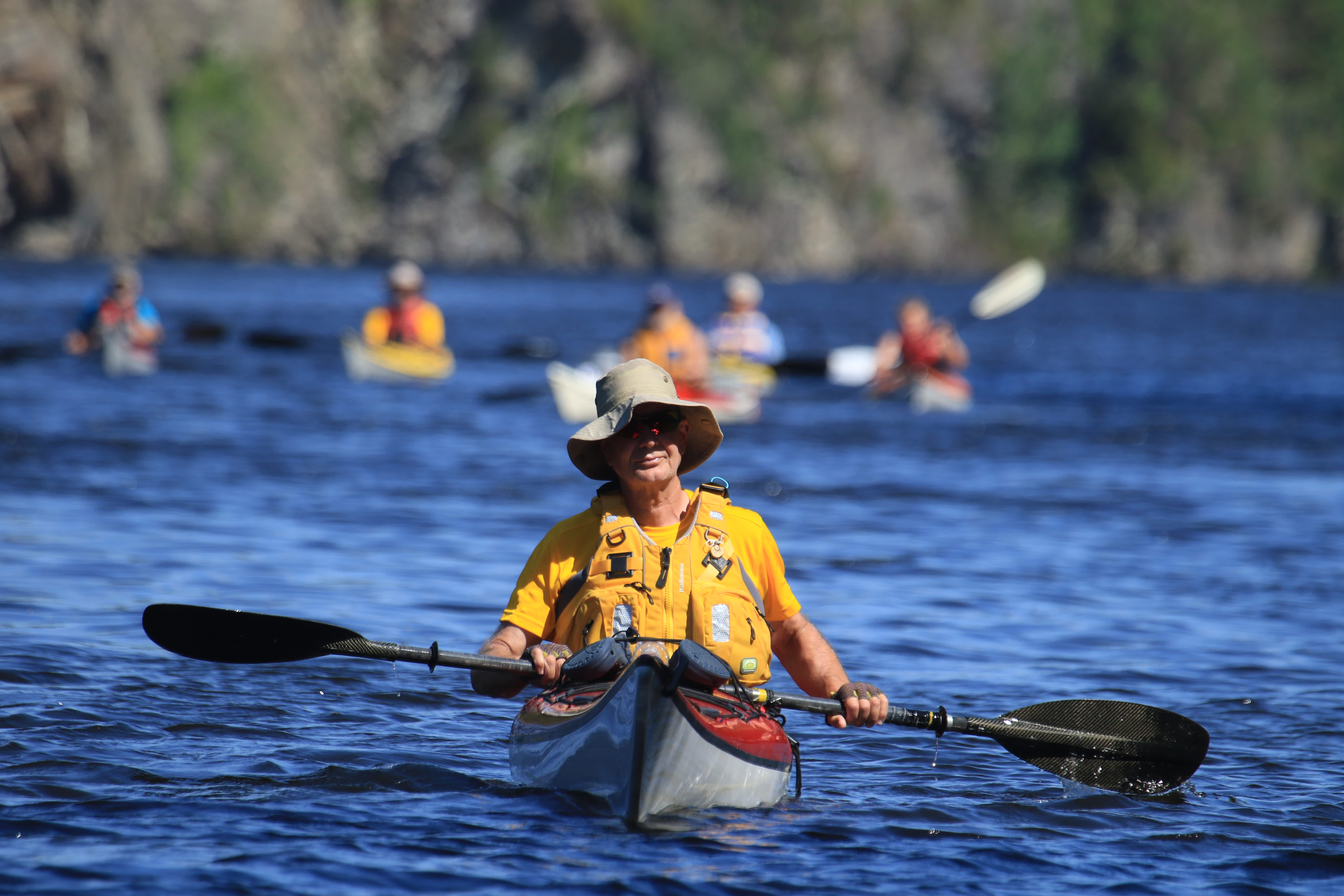 A man paddling a kayak in the Haldenkanalen.