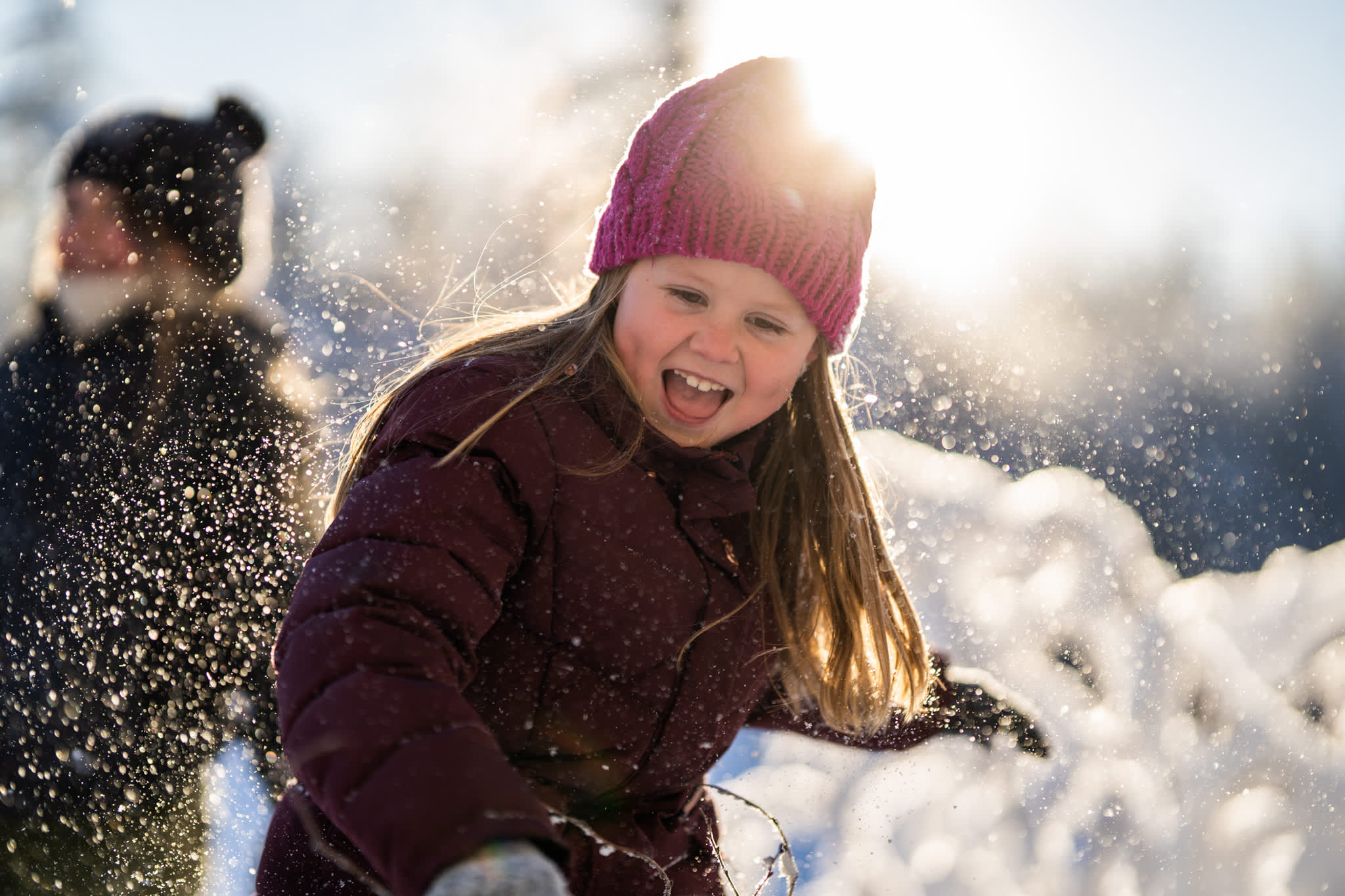 Girls basking in the snow