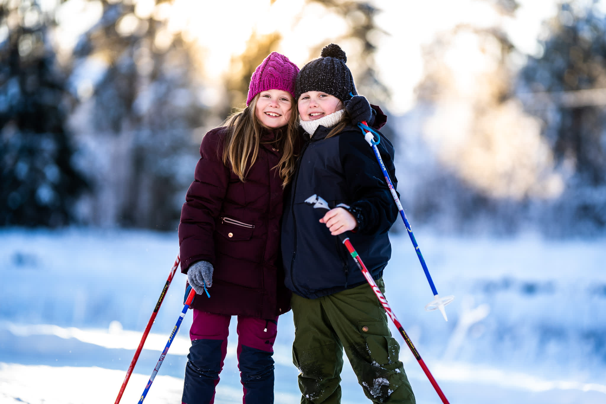 Two girls like two drops of water on skis