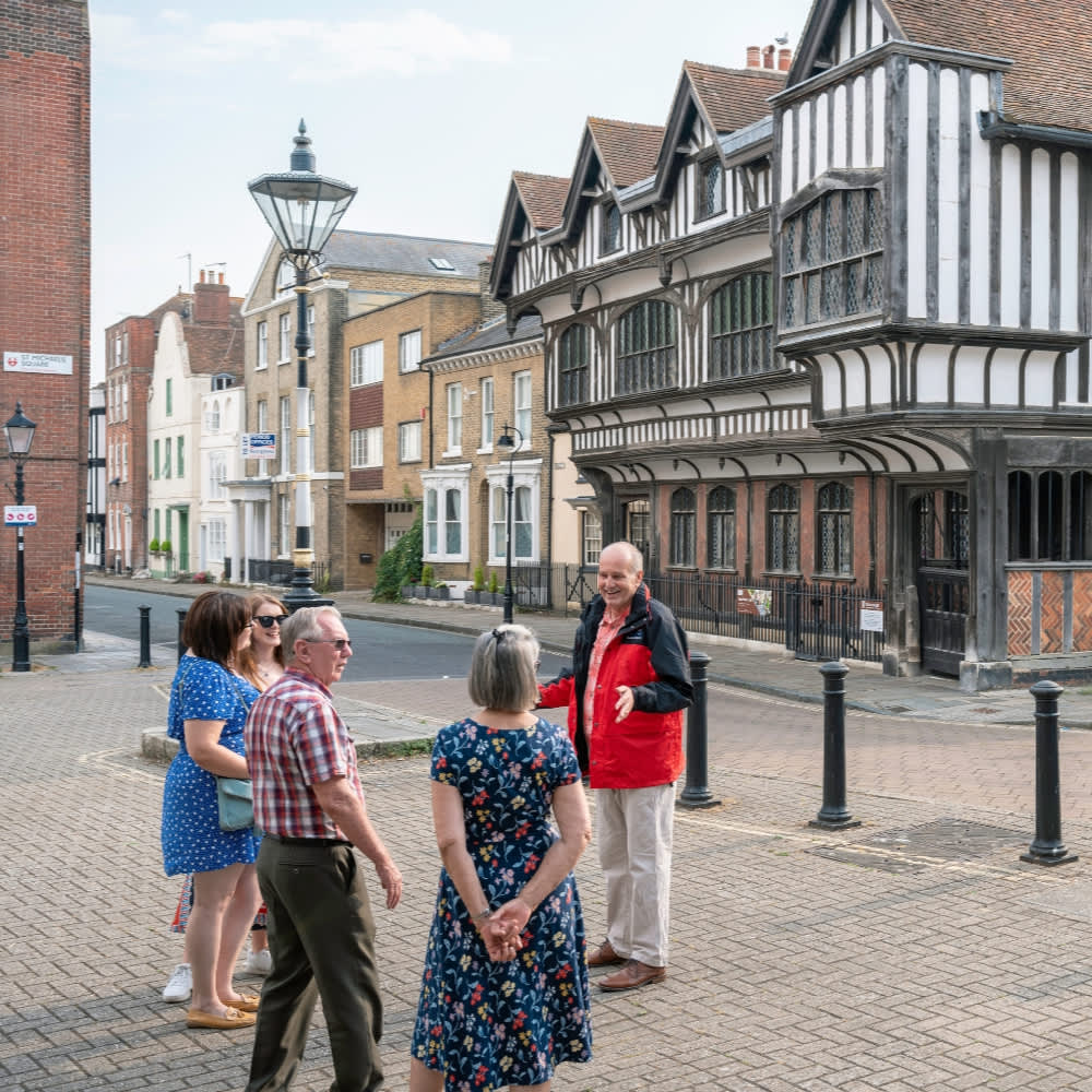 See Southampton Tour guide talking to small group of people outside Tudor House & Garden